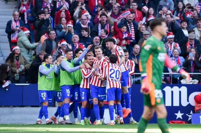 (251214) -- MADRID, Dec. 14, 2025 (Xinhua) -- Atletico de Madrid's Alexander Sorloth (C) celebrates a goal which is later disallowed during the Laliga football match between Atletico de Madrid and Valencia C.F. in Madrid, Spain, Dec. 13, 2025. (Photo by Gustavo Valiente/Xinhua)