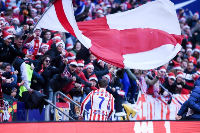 (251214) -- MADRID, Dec. 14, 2025 (Xinhua) -- Atletico de Madrid's Antoine Griezmann celebrates after scoring during the Laliga football match between Atletico de Madrid and Valencia C.F. in Madrid, Spain, Dec. 13, 2025. (Photo by Gustavo Valiente/Xinhua)