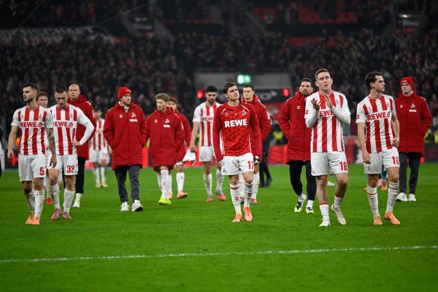 (251214) -- LEVERKUSEN, Dec. 14, 2025 (Xinhua) -- Players of FC Cologne look dejected after the German first division of Bundesliga football match between Bayer 04 Leverkusen and FC Cologne in Leverkusen, Germany, Dec. 13, 2025. (Photo by Ulrich Hufnagel/Xinhua)