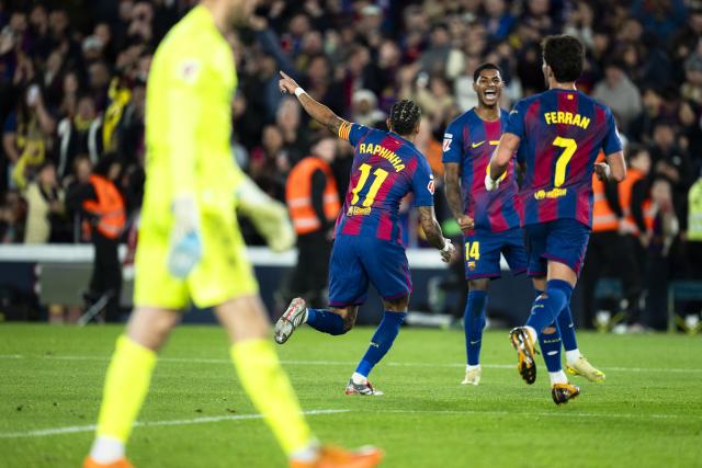 (251214) -- BARCELONA, Dec. 14, 2025 (Xinhua) -- FC Barcelona's Raphinha (2nd L) scores a goal during the Laliga football match between FC Barcelona and CA Osasuna in Barcelona, Spain, on Dec. 13, 2025. (Photo by Joan Gosa/Xinhua)