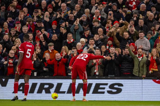 (251214) -- LIVERPOOL, Dec. 14, 2025 (Xinhua) -- Liverpool's Hugo Ekitike (front R) celebrates after scoring the second goal during the English Premier League match between Liverpool FC and Brighton & Hove Albion FC in Liverpool, Britain, on Dec. 13, 2025.  
FOR EDITORIAL USE ONLY. NOT FOR SALE FOR MARKETING OR ADVERTISING CAMPAIGNS. NO USE WITH UNAUTHORIZED AUDIO, VIDEO, DATA, FIXTURE LISTS, CLUB/LEAGUE LOGOS OR "LIVE" SERVICES. ONLINE IN-MATCH USE LIMITED TO 45 IMAGES, NO VIDEO EMULATION. NO USE IN BETTING, GAMES OR SINGLE CLUB/LEAGUE/PLAYER PUBLICATIONS. (Xinhua)