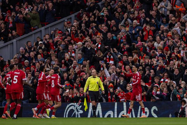 (251214) -- LIVERPOOL, Dec. 14, 2025 (Xinhua) -- Liverpool's Hugo Ekitike (front 1st R) celebrates after scoring the first goal during the English Premier League match between Liverpool FC and Brighton & Hove Albion FC in Liverpool, Britain, on Dec. 13, 2025.  
FOR EDITORIAL USE ONLY. NOT FOR SALE FOR MARKETING OR ADVERTISING CAMPAIGNS. NO USE WITH UNAUTHORIZED AUDIO, VIDEO, DATA, FIXTURE LISTS, CLUB/LEAGUE LOGOS OR "LIVE" SERVICES. ONLINE IN-MATCH USE LIMITED TO 45 IMAGES, NO VIDEO EMULATION. NO USE IN BETTING, GAMES OR SINGLE CLUB/LEAGUE/PLAYER PUBLICATIONS. (Xinhua)