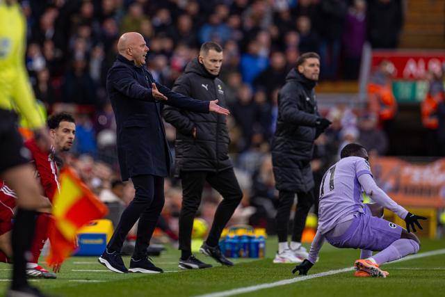 (251214) -- LIVERPOOL, Dec. 14, 2025 (Xinhua) -- Liverpool's head coach Arne Slot (1st L) reacts during the English Premier League match between Liverpool FC and Brighton & Hove Albion FC in Liverpool, Britain, on Dec. 13, 2025.  
FOR EDITORIAL USE ONLY. NOT FOR SALE FOR MARKETING OR ADVERTISING CAMPAIGNS. NO USE WITH UNAUTHORIZED AUDIO, VIDEO, DATA, FIXTURE LISTS, CLUB/LEAGUE LOGOS OR "LIVE" SERVICES. ONLINE IN-MATCH USE LIMITED TO 45 IMAGES, NO VIDEO EMULATION. NO USE IN BETTING, GAMES OR SINGLE CLUB/LEAGUE/PLAYER PUBLICATIONS. (Xinhua)