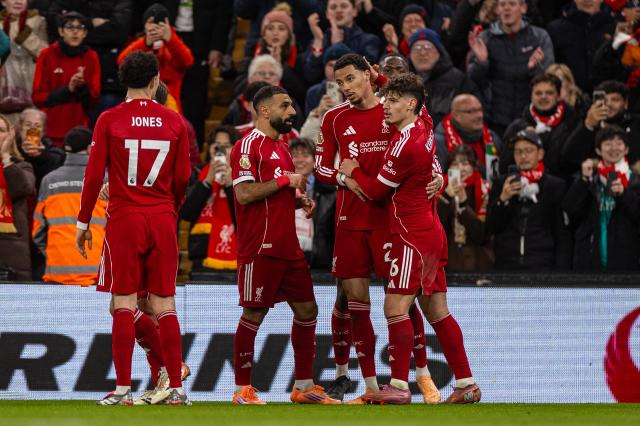 (251214) -- LIVERPOOL, Dec. 14, 2025 (Xinhua) -- Liverpool's Hugo Ekitike (2nd R) celebrates after scoring the second goal during the English Premier League match between Liverpool FC and Brighton & Hove Albion FC in Liverpool, Britain, on Dec. 13, 2025.  
FOR EDITORIAL USE ONLY. NOT FOR SALE FOR MARKETING OR ADVERTISING CAMPAIGNS. NO USE WITH UNAUTHORIZED AUDIO, VIDEO, DATA, FIXTURE LISTS, CLUB/LEAGUE LOGOS OR "LIVE" SERVICES. ONLINE IN-MATCH USE LIMITED TO 45 IMAGES, NO VIDEO EMULATION. NO USE IN BETTING, GAMES OR SINGLE CLUB/LEAGUE/PLAYER PUBLICATIONS. (Xinhua)