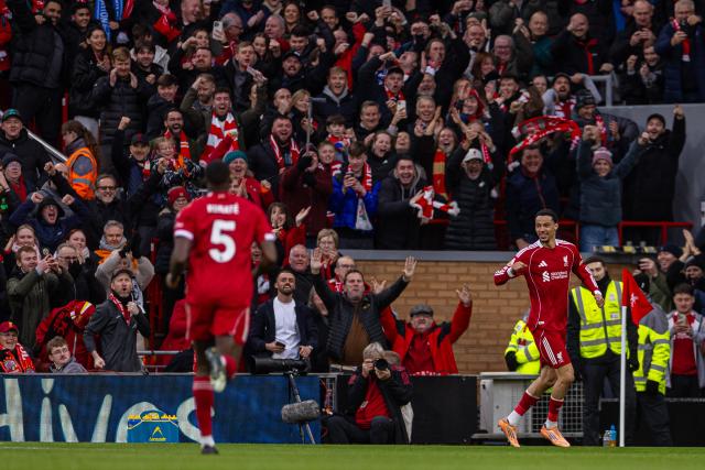 (251214) -- LIVERPOOL, Dec. 14, 2025 (Xinhua) -- Liverpool's Hugo Ekitike (front R) celebrates after scoring the first goal during the English Premier League match between Liverpool FC and Brighton & Hove Albion FC in Liverpool, Britain, on Dec. 13, 2025.  
FOR EDITORIAL USE ONLY. NOT FOR SALE FOR MARKETING OR ADVERTISING CAMPAIGNS. NO USE WITH UNAUTHORIZED AUDIO, VIDEO, DATA, FIXTURE LISTS, CLUB/LEAGUE LOGOS OR "LIVE" SERVICES. ONLINE IN-MATCH USE LIMITED TO 45 IMAGES, NO VIDEO EMULATION. NO USE IN BETTING, GAMES OR SINGLE CLUB/LEAGUE/PLAYER PUBLICATIONS. (Xinhua)