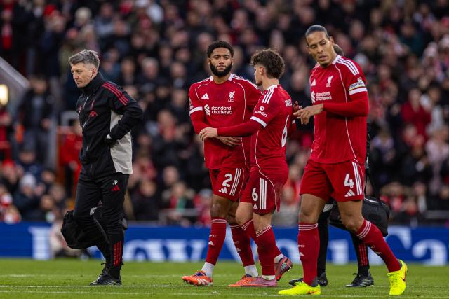 (251214) -- LIVERPOOL, Dec. 14, 2025 (Xinhua) -- Liverpool's Joe Gomez (2nd L) walks off injured during the English Premier League match between Liverpool FC and Brighton & Hove Albion FC in Liverpool, Britain, on Dec. 13, 2025.  
FOR EDITORIAL USE ONLY. NOT FOR SALE FOR MARKETING OR ADVERTISING CAMPAIGNS. NO USE WITH UNAUTHORIZED AUDIO, VIDEO, DATA, FIXTURE LISTS, CLUB/LEAGUE LOGOS OR "LIVE" SERVICES. ONLINE IN-MATCH USE LIMITED TO 45 IMAGES, NO VIDEO EMULATION. NO USE IN BETTING, GAMES OR SINGLE CLUB/LEAGUE/PLAYER PUBLICATIONS. (Xinhua)