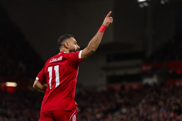 (251214) -- LIVERPOOL, Dec. 14, 2025 (Xinhua) -- Liverpool's Mohamed Salah celebrates after assisting the second goal during the English Premier League match between Liverpool FC and Brighton & Hove Albion FC in Liverpool, Britain, on Dec. 13, 2025.  
FOR EDITORIAL USE ONLY. NOT FOR SALE FOR MARKETING OR ADVERTISING CAMPAIGNS. NO USE WITH UNAUTHORIZED AUDIO, VIDEO, DATA, FIXTURE LISTS, CLUB/LEAGUE LOGOS OR "LIVE" SERVICES. ONLINE IN-MATCH USE LIMITED TO 45 IMAGES, NO VIDEO EMULATION. NO USE IN BETTING, GAMES OR SINGLE CLUB/LEAGUE/PLAYER PUBLICATIONS. (Xinhua)