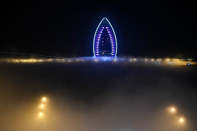(251214) -- ASHGABAT, Dec. 14, 2025 (Xinhua) -- This photo taken on Dec. 13, 2025 shows advection fog in Ashgabat, Turkmenistan. (Xinhua/Li Renzi)