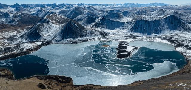 (251214) -- LHASA, Dec. 14, 2025 (Xinhua) -- An aerial drone photo taken on Dec. 13, 2025 shows the scenery of a lake in Maizhokunggar County, southwest China's Xizang Autonomous Region. (Xinhua/Tenzin Nyida)