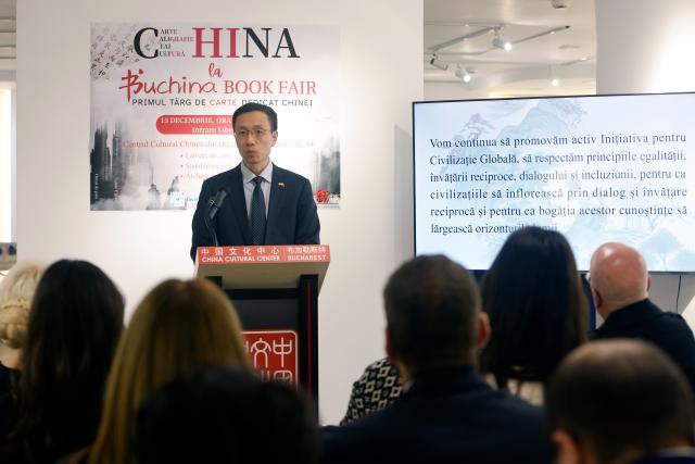 (251214) -- BUCHAREST, Dec. 14, 2025 (Xinhua) -- Chen Feng, Chinese ambassador to Romania, speaks during the opening ceremony of the 4th edition of the Buchina Book Fair at the China Cultural Center in Bucharest, Romania, Dec. 13, 2025. Buchina is a book fair dedicated to Chinese literature, culture and art. (Photo by Cristian Cristel/Xinhua)