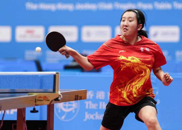 (251214) -- HONG KONG, Dec. 14, 2025 (Xinhua) -- Tang Yixin competes during the women's singles category TT11 table tennis final match between Tang Yixin of Jilin and Li Meng of Shaanxi at China's 12th National Games for Persons with Disabilities and the 9th National Special Olympic Games in Hong Kong, south China, Dec. 14, 2025. (Xinhua/Zhu Zheng)