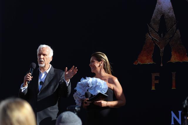 (251214) -- WELLINGTON, Dec. 14, 2025 (Xinhua) -- James Cameron (L), director of the film "Avatar: Fire and Ash", speaks at the New Zealand premiere of the film in Wellington, New Zealand, Dec. 13, 2025. The premiere was held here on Saturday, with the participation of director James Cameron and the film's cast. (Photo by Meng Tao/Xinhua)