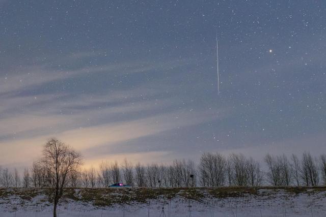 (251214) -- HARBIN, Dec. 14, 2025 (Xinhua) -- This photo taken on Dec. 13, 2025 shows the Geminid meteor shower in the sky over Fujin City, northeast China's Heilongjiang Province. The Geminid meteor shower, one of the most spectacular meteor showers of the year, reached its peak on Sunday. (Photo by Qu Yubao/Xinhua)
