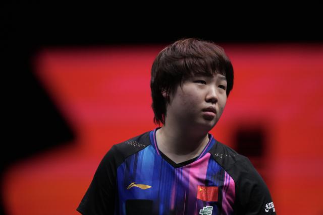 (251214) -- HONG KONG, Dec. 14, 2025 (Xinhua) -- Kuai Man reacts during the women's singles final between Wang Manyu of China and Kuai Man of China at the WTT Finals Hong Kong 2025 in Hong Kong, south China, Dec. 14, 2025. (Xinhua/Lui Siu Wai)