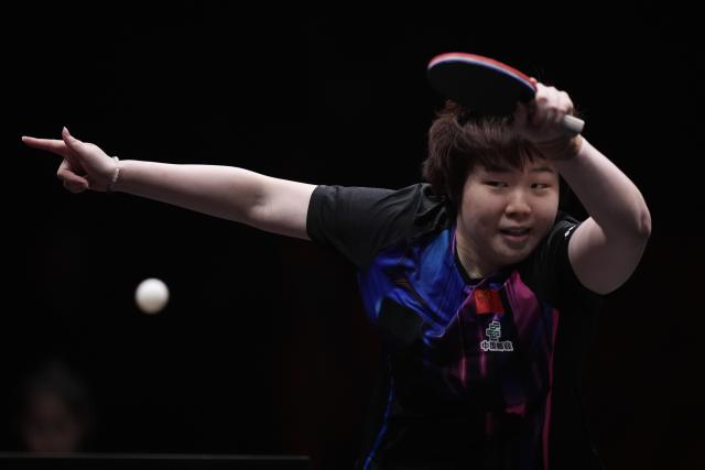 (251214) -- HONG KONG, Dec. 14, 2025 (Xinhua) -- Kuai Man competes during the women's singles final between Wang Manyu of China and Kuai Man of China at the WTT Finals Hong Kong 2025 in Hong Kong, south China, Dec. 14, 2025. (Xinhua/Lui Siu Wai)