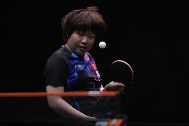 (251214) -- HONG KONG, Dec. 14, 2025 (Xinhua) -- Kuai Man competes during the women's singles final between Wang Manyu of China and Kuai Man of China at the WTT Finals Hong Kong 2025 in Hong Kong, south China, Dec. 14, 2025. (Xinhua/Lui Siu Wai)