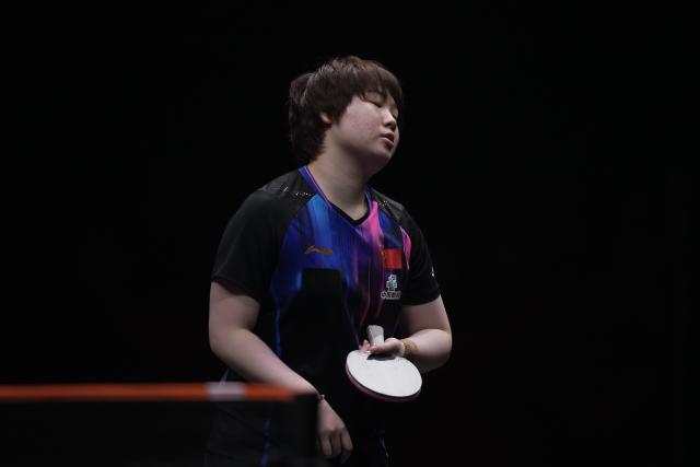 (251214) -- HONG KONG, Dec. 14, 2025 (Xinhua) -- Kuai Man reacts during the women's singles final between Wang Manyu of China and Kuai Man of China at the WTT Finals Hong Kong 2025 in Hong Kong, south China, Dec. 14, 2025. (Xinhua/Lui Siu Wai)