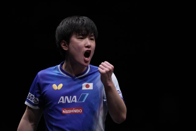 (251214) -- HONG KONG, Dec. 14, 2025 (Xinhua) -- Harimoto Tomokazu reacts during the men's singles final match between Harimoto Tomokazu of Japan and Truls Moregard of Sweden at the WTT Finals Hong Kong 2025 in Hong Kong, south China, Dec. 14, 2025. (Xinhua/Lui Siu Wai)