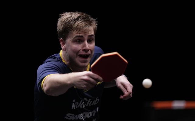 (251214) -- HONG KONG, Dec. 14, 2025 (Xinhua) -- Truls Moregard competes during the men's singles final match between Harimoto Tomokazu of Japan and Truls Moregard of Sweden at the WTT Finals Hong Kong 2025 in Hong Kong, south China, Dec. 14, 2025. (Xinhua/Lui Siu Wai)