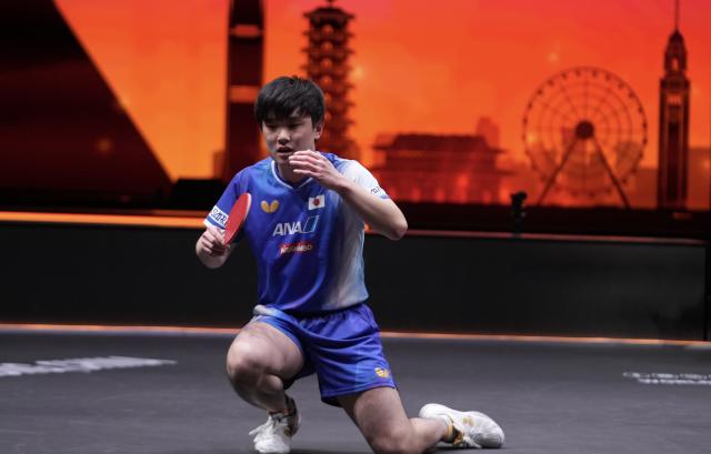 (251214) -- HONG KONG, Dec. 14, 2025 (Xinhua) -- Harimoto Tomokazu reacts after the men's singles final match between Harimoto Tomokazu of Japan and Truls Moregard of Sweden at the WTT Finals Hong Kong 2025 in Hong Kong, south China, Dec. 14, 2025. (Xinhua/Lui Siu Wai)