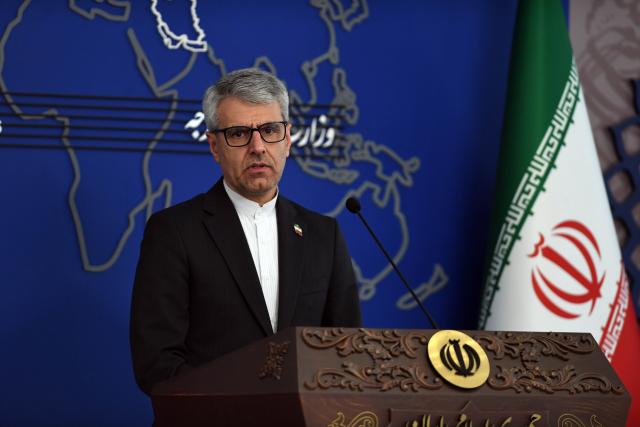 (251214) -- TEHRAN, Dec. 14, 2025 (Xinhua) -- Iranian Foreign Ministry spokesman Esmaeil Baghaei is pictured during a press conference in Tehran, Iran, Dec. 14, 2025. Iran's Foreign Ministry on Sunday dismissed accusations by Lebanese Foreign Minister Youssef Rajji that Tehran is interfering in Beirut's internal affairs, characterizing the nations' diplomatic ties as "age-old" and enduring. (Xinhua/Shadati)