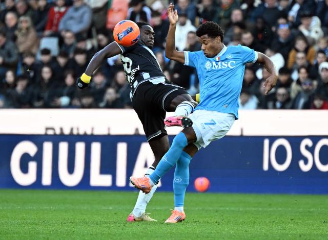 (251215) -- UDINE, Dec. 15, 2025 (Xinhua) -- Udinese's Oumar Solet (L) vies with Napoli's David Neres during a Serie A football match between Udinese and Napoli in Udine, Italy, Dec.14, 2025. (Photo by Diego Petrussi/Xinhua)