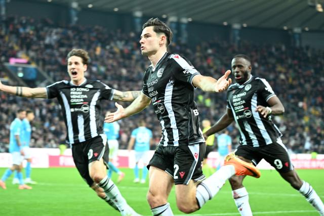 (251215) -- UDINE, Dec. 15, 2025 (Xinhua) -- Udinese's Jurgen Ekkelenkamp (C) celebrates his goal during a Serie A football match between Udinese and Napoli in Udine, Italy, Dec.14, 2025. (Photo by Diego Petrussi/Xinhua)