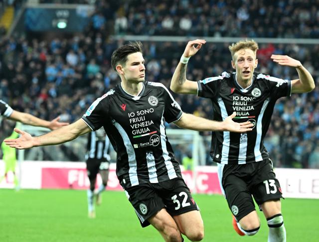 (251215) -- UDINE, Dec. 15, 2025 (Xinhua) -- Udinese's Jurgen Ekkelenkamp (L) celebrates his goal during a Serie A football match between Udinese and Napoli in Udine, Italy, Dec.14, 2025. (Photo by Diego Petrussi/Xinhua)
