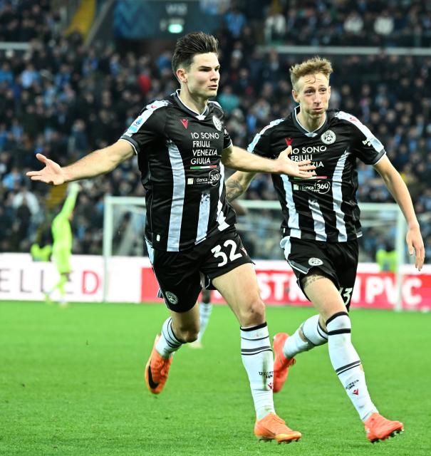 (251215) -- UDINE, Dec. 15, 2025 (Xinhua) -- Udinese's Jurgen Ekkelenkamp (L) celebrates his goal during a Serie A football match between Udinese and Napoli in Udine, Italy, Dec.14, 2025. (Photo by Diego Petrussi/Xinhua)