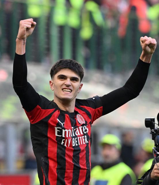 (251215) -- MILAN, Dec. 15, 2025 (Xinhua) -- AC Milan's Davide Bartesaghi celebrates his goal during a Serie A football match between AC Milan and Sassuolo in Milan, Italy, Dec. 14, 2025. (Photo by Alberto Lingria/Xinhua)