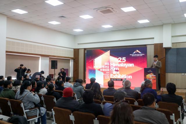 (251215) -- KATHMANDU, Dec. 15, 2025 (Xinhua) -- The opening ceremony of the 2025 Himalayan Rim Regional Film Exhibition is held in Kathmandu, Nepal, Dec. 14, 2025.
  The 2025 Himalayan Rim Regional Film Exhibition commenced at Nepal's Tribhuvan University in Kathmandu on Sunday.
  Themed "Civilizational Mutual Learning, Technological Innovation," the event utilized a rich array of forms, including animated film screenings, craft workshops, cultural creative displays, and cinematic dialogues, to bring an audiovisual feast where traditional Chinese culture seamlessly blends with modern technology to young students.
  The eight-day touring exhibition, featuring four Chinese animation films, will also make stops at Kathmandu University and Lumbini Buddhist University. (Photo by Sulav Shrestha/Xinhua)