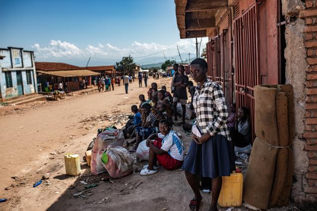 (251215) -- UVIRA, Dec. 15, 2025 (Xinhua) -- Displaced people take a break in Uvira, a city in South Kivu Province in the eastern Democratic Republic of the Congo (DRC), on Dec. 14, 2025.
  Over 500,000 people, including more than 100,000 children, have been displaced since Dec. 1 due to intense fighting in South Kivu Province in eastern DRC, the United Nations Children's Fund (UNICEF) said on Sunday.
  Earlier last week, the March 23 Movement (M23) rebel group announced that it had seized Uvira, the second-largest city in South Kivu near the Burundian border, amid the latest round of offensives in the province. (Photo by Zanem Nety Zaidi/Xinhua)