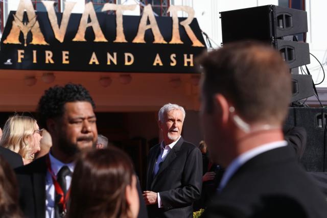 (251215) -- BEIJING, Dec. 15, 2025 (Xinhua) -- James Cameron (C), director of the film "Avatar: Fire and Ash", attends the New Zealand premiere of the film in Wellington, New Zealand, Dec. 13, 2025.
  The premiere was held here on Dec. 13, with the participation of director James Cameron and the film's cast. (Photo by Meng Tao/Xinhua)