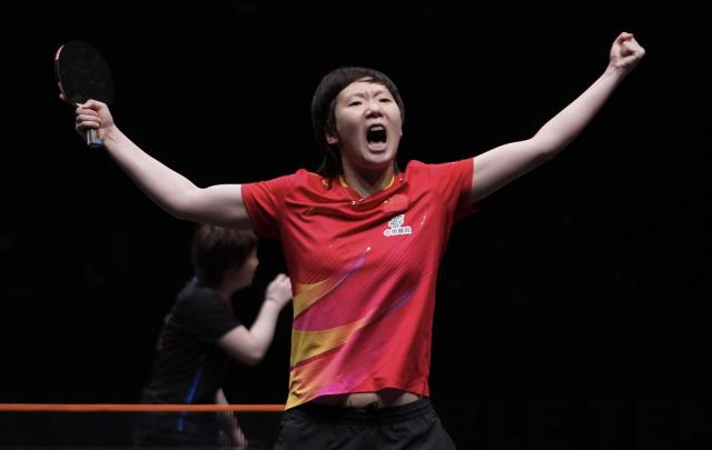 (251215) -- BEIJING, Dec. 15, 2025 (Xinhua) -- Wang Manyu celebrates after the women's singles final between Wang Manyu of China and Kuai Man of China at the WTT Finals Hong Kong 2025 in Hong Kong, south China, Dec. 14, 2025. (Xinhua/Lui Siu Wai)