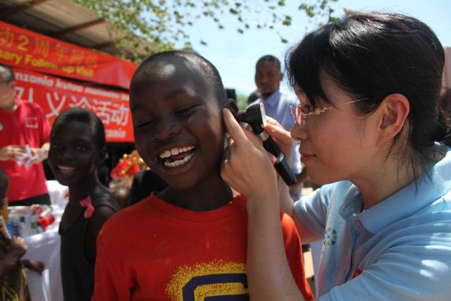 (251215) -- DAR ES SALAAM, Dec. 15, 2025 (Xinhua) -- A member of a Chinese medical team provides free clinical services at an orphanage in Dar es Salaam, Tanzania, on Dec. 13, 2025. Chinese medical teams in Tanzania mainland and Zanzibar offered free clinical services to children at two orphanages in Dar es Salaam over the weekend, as part of a China-Africa joint initiative to promote the well-being of orphans.
  TO GO WITH "Chinese medical teams provide free healthcare services to children at Dar es Salaam orphanages" (Xinhua/Emmanuel Herman)