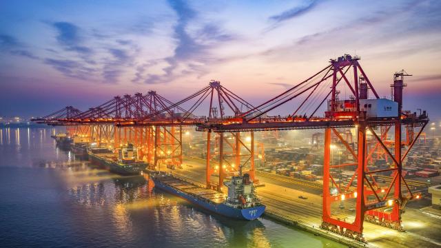 (251215) -- BEIJING, Dec. 15, 2025 (Xinhua) -- An aerial drone photo taken on Dec. 15, 2025 shows vessels loading and unloading containers at a container dock of Tangshan Port in Tangshan, north China's Hebei Province.
  China's economy has maintained steady momentum in November, creating favorable conditions to achieve the annual growth target, as revealed by the latest economic indicators on Monday.
  In November, the country's value-added industrial output expanded 4.8 percent year on year. In the first 11 months, the industrial output increased by 6 percent. (Photo by Liu Mancang/Xinhua)