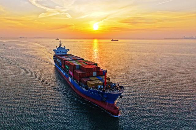 (251215) -- BEIJING, Dec. 15, 2025 (Xinhua) -- An aerial drone photo taken on Dec. 15, 2025 shows a container vessel sailing into Yantai Port in Yantai, east China's Shandong Province.
  China's economy has maintained steady momentum in November, creating favorable conditions to achieve the annual growth target, as revealed by the latest economic indicators on Monday.
  In November, the country's value-added industrial output expanded 4.8 percent year on year. In the first 11 months, the industrial output increased by 6 percent. (Photo by Sun Wentan/Xinhua)
