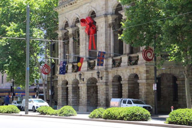 (251215) -- SYDNEY, Dec. 15, 2025 (Xinhua) -- Flags fly at half-mast at the Adelaide Town Hall in Adelaide, Australia, Dec. 15, 2025.
  The death toll from a shooting at Sydney's Bondi Beach on Sunday has risen to 16, with a father and son identified as the attackers, police said Monday.
  The deceased range in age from 10 to 87 years old and includes one of the attackers.
   Another 40 people were being treated in hospital for their injuries as of Monday morning, five of whom were in critical condition. (Photo by Lyu Wei/Xinhua)