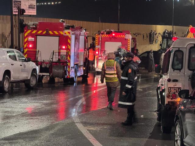(251215) -- SAFI PROVINCE, Dec. 15, 2025 (Xinhua) -- Rescuers from the local security and civil defense department work in a flood-hit area in Safi province, Morocco, Dec. 14, 2025. At least 41 people were killed in flash floods caused by heavy rainfall in Morocco on Sunday, authorities said on Monday.
   In the Atlantic coastal province of Safi, local authorities said in a statement that the death toll had risen to 37, with 14 injured people receiving treatment at local hospitals.
   In the southern province of Tinghir, four people were killed after their vehicle was swept away by strong currents and overturned into a river between the areas of Fezou and El Hafira, local news outlet Hibapress reported. (Photo by Saouri Aissa/Xinhua)