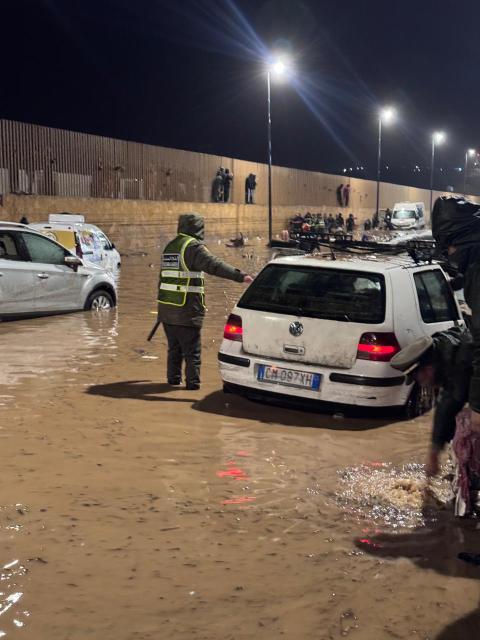 (251215) -- SAFI PROVINCE, Dec. 15, 2025 (Xinhua) -- Rescuers from the local security and civil defense department work in a flood-hit area in Safi province, Morocco, Dec. 14, 2025. At least 41 people were killed in flash floods caused by heavy rainfall in Morocco on Sunday, authorities said on Monday.
   In the Atlantic coastal province of Safi, local authorities said in a statement that the death toll had risen to 37, with 14 injured people receiving treatment at local hospitals.
   In the southern province of Tinghir, four people were killed after their vehicle was swept away by strong currents and overturned into a river between the areas of Fezou and El Hafira, local news outlet Hibapress reported. (Photo by Saouri Aissa/Xinhua)