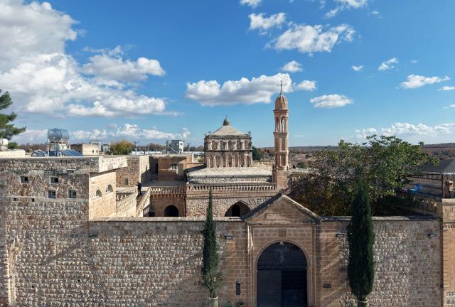 (251215) -- MIDYAT, Dec. 15, 2025 (Xinhua) -- A drone photo taken on Dec. 14, 2025 shows the historic Anitli neighborhood in Midyat, Mardin province, Türkiye. Anitli has been named one of the "Best Tourism Villages 2025" by the United Nations World Tourism Organization (UNWTO), a designation expected to further boost the area's growing tourism momentum. It has preserved its natural charm and is home to historic landmarks that captivate visitors. (Mustafa Kaya/Handout via Xinhua)