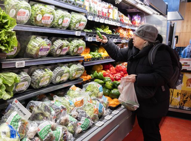 (251215) -- TORONTO, Dec. 15, 2025 (Xinhua) -- A customer shops for groceries at a supermarket in Toronto, Canada, on Dec. 15, 2025. Canada's Consumer Price Index (CPI) rose 2.2 percent year on year in November, matching the increase in October, Statistics Canada said on Monday. (Photo by Zou Zheng/Xinhua)