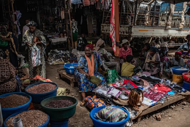 (251215) -- UVIRA, Dec. 15, 2025 (Xinhua) -- Vendors sell goods in Uvira, a city in South Kivu Province in the eastern Democratic Republic of the Congo (DRC), on Dec. 15, 2025. In Uvira, a strategic city in eastern DRC, streets are being swept, shops are cautiously reopening, and residents are stepping back into public spaces as daily life begins to move again. (Photo by Zanem Nety Zaidi/Xinhua)