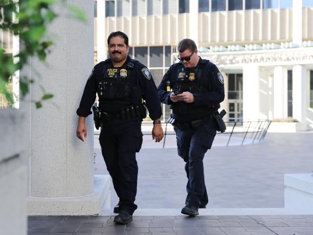 (251216) -- LOS ANGELES, Dec. 16, 2025 (Xinhua) -- Police officers of the U.S. Department of Homeland Security are on duty at the Metropolitan Detention Center in Los Angeles, California, the United States on Dec. 15, 2025. Four people accused of plotting New Year's Eve bombings in California have been arrested, U.S. authorities said Monday. (Photo by Qiu Chen/Xinhua)