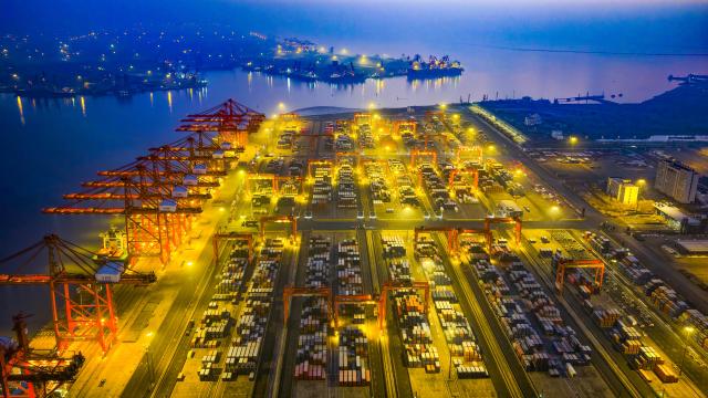 (251216) -- BEIJING, Dec. 16, 2025 (Xinhua) -- An aerial drone photo taken on Dec. 15, 2025 shows a container dock at Tangshan Port in Tangshan, north China's Hebei Province.
  China's economy has maintained steady momentum in November, creating favorable conditions to achieve the annual growth target, as revealed by the latest economic indicators on Monday.
  In November, the country's value-added industrial output expanded 4.8 percent year on year. In the first 11 months, the industrial output increased by 6 percent. (Photo by Liu Mancang/Xinhua)