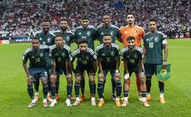 (251216) -- AL KHOR, Dec. 16, 2025 (Xinhua) -- Players of Saudi Arabia pose for a group photo prior to the FIFA Arab Cup 2025 Semi-final match between Saudi Arabia and Jordan at Al Bayt Stadium in Al Khor, Qatar, on Dec. 15, 2025. (Photo by Nikku/Xinhua)