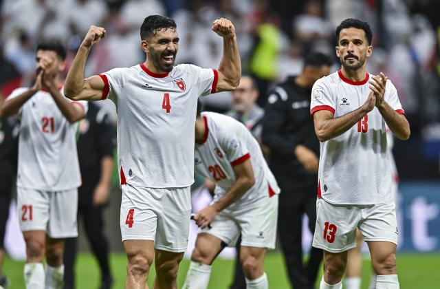 (251216) -- AL KHOR, Dec. 16, 2025 (Xinhua) -- Players of Jordan celebrate after the FIFA Arab Cup 2025 Semi-final match between Saudi Arabia and Jordan at Al Bayt Stadium in Al Khor, Qatar, on Dec. 15, 2025. (Photo by Nikku/Xinhua)