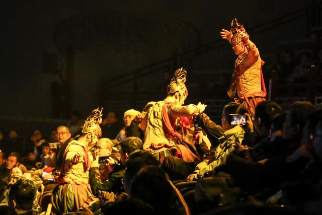 (251216) -- DUNHUANG, Dec. 16, 2025 (Xinhua) -- An immersive dance drama "Ancient Sound of Dunhuang" is staged in Dunhuang, northwest China's Gansu Province, Dec. 15, 2025.
  Blending elements drawn from the murals and sculptures of Dunhuang, the performance features elaborately designed stage, holographic display, and awe-inspiring dance. (Xinhua/Lang Bingbing)