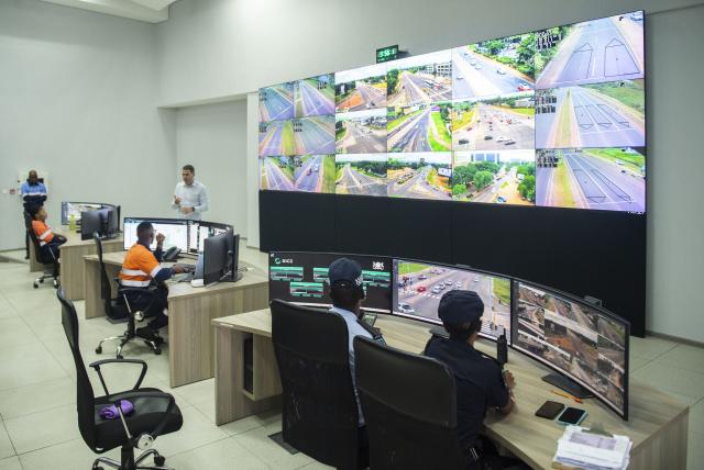 (251216) -- GABORONE, Dec. 16, 2025 (Xinhua) -- This photo taken on Dec. 15, 2025 shows people working at the Traffic Signals Modernization and Centralized Traffic Control Center in Gaborone, Botswana. Botswana's President Duma Boko on Tuesday launched the Traffic Signals Modernization and Centralized Traffic Control Center for the country's capital city Gaborone and the surrounding areas to address urban congestion and improve road safety.
   The centralized, smart system integrates traffic lights, surveillance cameras, speed enforcement and real-time monitoring into one coordinated control center, enabling proactive traffic management, quicker incident response and improved road safety across Greater Gaborone and surrounding settlements, according to Boko's social media account.
  TO GO WITH "(Special for CAFS) Botswana launches centralized traffic control system to address congestion, enhance safety " (Photo by Tshekiso Tebalo/Xinhua)