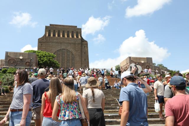 (251216) -- PRETORIA, Dec. 16, 2025 (Xinhua) -- People participate in a celebration of the Day of Reconciliation at the Voortrekker Monument in Pretoria, South Africa, on Dec. 16, 2025. December 16 was called the Day of the Vow in South Africa. It was renamed the Day of Reconciliation in 1994 after the end of apartheid, with the intention of fostering reconciliation and national unity. (Xinhua/Chen Wei)